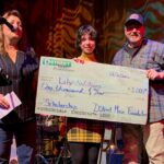 Kevin & Laurie present scholarship to student